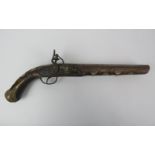 A vintage replica 18th century style flintlock pistol. With foliate brass and mother of pearl