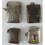 Two golf themed silver vesta cases, one with an embossed image of a golfer, hallmarked Chester