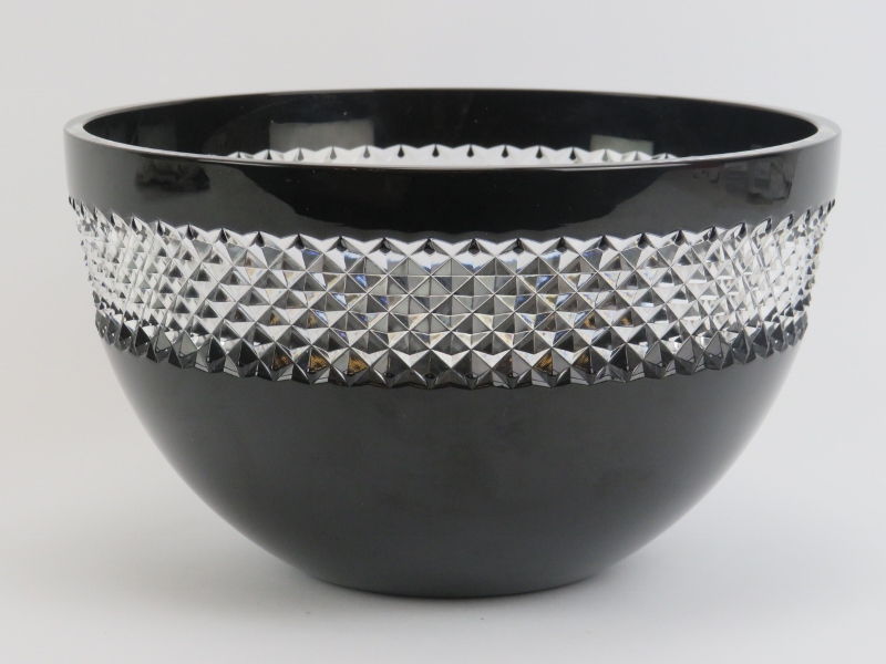 A Waterford lead crystal black glass bowl with clear diamond cut rim by John Rocha. Maker/designer