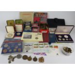 A large collection of commemorative, proof and circulated coins including some silver. British