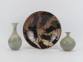 A glazed studio pottery bowl by Nick Chapman together with two studio pottery vases. Both vases with