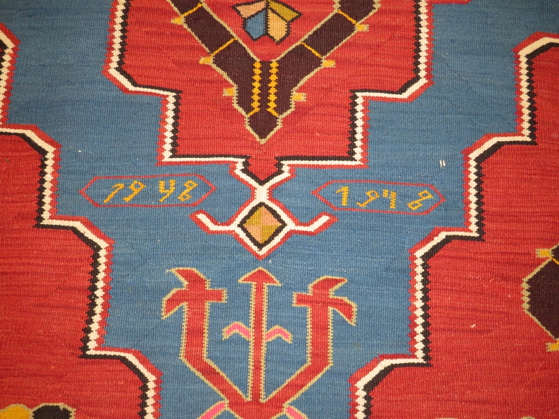 A large 20th century Armenian Kilim rug, vibrant colours, blue on burnt amber field. 340cm x - Image 3 of 3