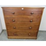 An unusual Victorian mahogany chest, the top section with fall front, opening onto a fitted interior