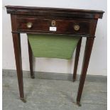 A Regency Period rosewood turnover worktable, the folding top over one long frieze drawer with