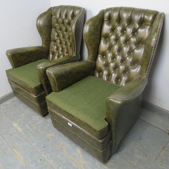 A pair of vintage Chesterfield style wingback armchairs, upholstered in faux green leather with - Image 2 of 3