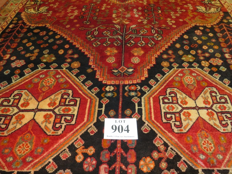 A South West Persian Qashgai carpet, central motif, blue, cream & burnt amber field, very thick - Image 2 of 2