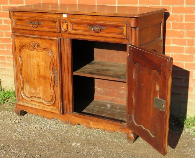 An 18th century and later French fruitwood sideboard, housing two short drawers above cupboards with - Image 3 of 3