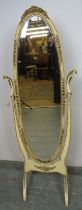 A vintage French bevelled cheval mirror, within a cream and gold gesso surround in the Louis XV