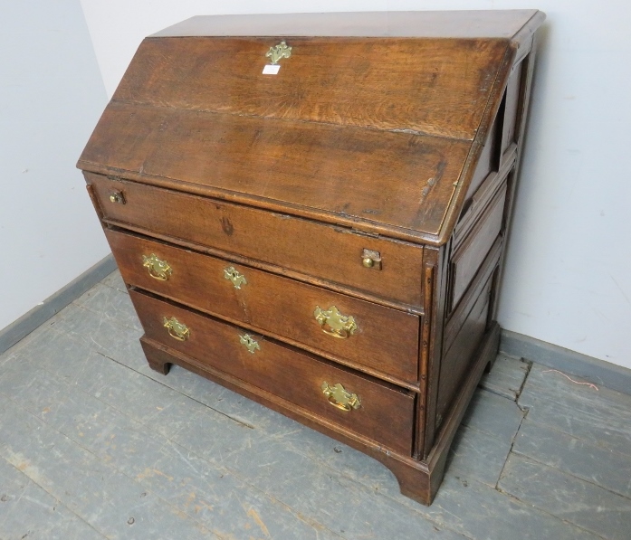 A late 17th century oak bureau of good colour, the fall front opening onto a fitted interior with - Image 2 of 6