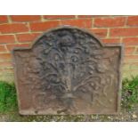 A 17th century Carolean cast iron fireback, having relief moulded decoration depicting a tree of