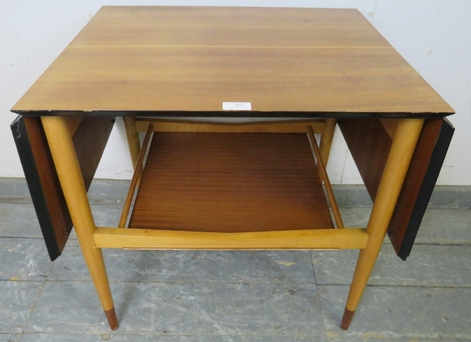 A mid-century teak drop-leaf two-tier table, with chamfered and ebonised edge above a galleried - Image 3 of 3