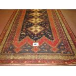 A central Persian Sumak Kilim rug, four interlocking diamond pattern to centre, cream on blue & red.