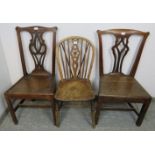 A matched pair of Georgian oak country chairs, with shaped and pierced backsplats, on square