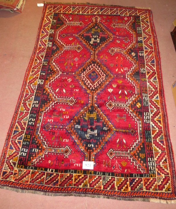South West Persian Lori rug, three central diamond motif on red ground and depicting stylised - Image 2 of 3