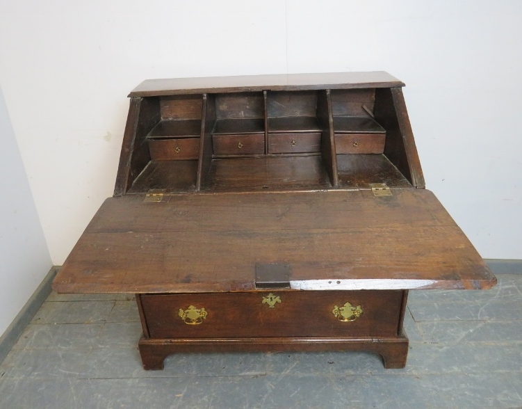 A late 17th century oak bureau of good colour, the fall front opening onto a fitted interior with - Image 3 of 6