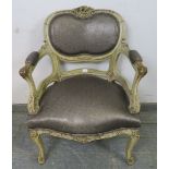 A 19th century French open-sided armchair, the well-carved painted frame having profuse acanthus