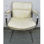 A mid-century desk chair in the manner of Peiff, upholstered in cream leather with black piping,