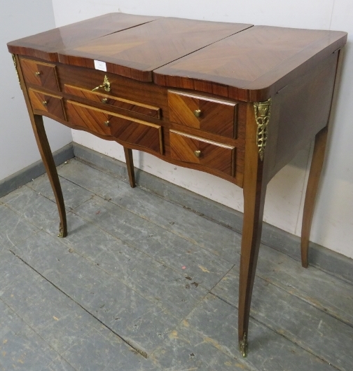 A vintage French mahogany and tulipwood dressing table with gilt brass mounts, the rising central - Image 2 of 3