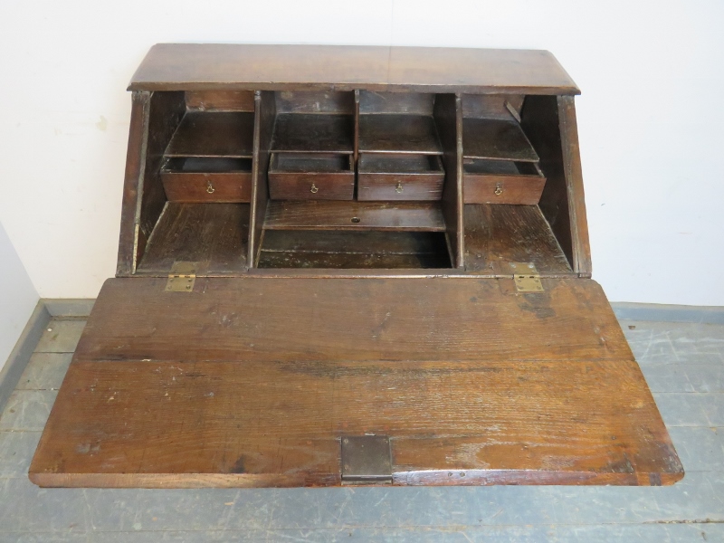 A late 17th century oak bureau of good colour, the fall front opening onto a fitted interior with - Image 5 of 6