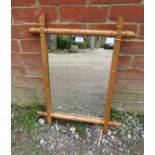 A vintage rectangular wall mirror within a faux bamboo beech surround. H65cm W51cm D3cm (approx).