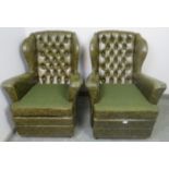 A pair of vintage Chesterfield style wingback armchairs, upholstered in faux green leather with