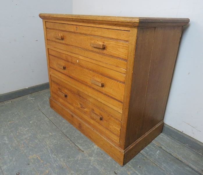 An Art Deco Period chest, housing three graduated long drawers with reeded bar handles, on a - Image 2 of 3