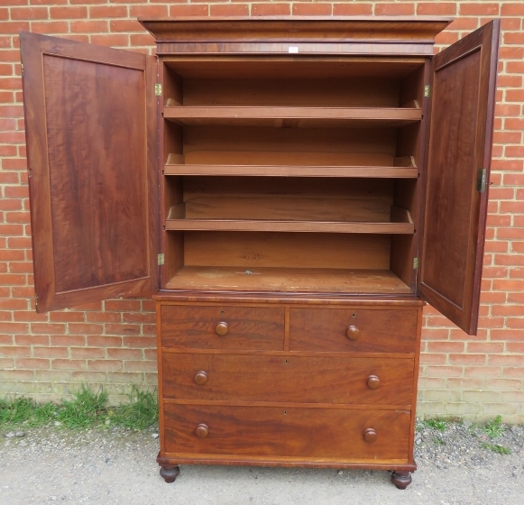 A Victorian mahogany linen press of good colour, the moulded cornice above panelled doors opening - Image 3 of 3