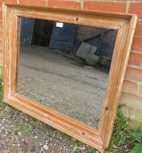 An antique pitch pine wall mirror within a moulded rectangular surround. H70cm W80cm D7cm ( - Image 2 of 2