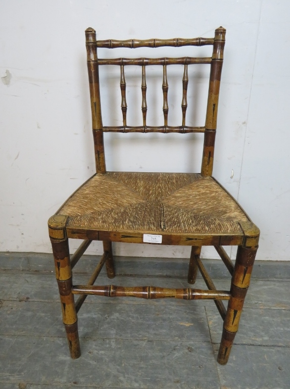 A Regency Period faux bamboo occasional chair, retaining the original polychrome paintwork and