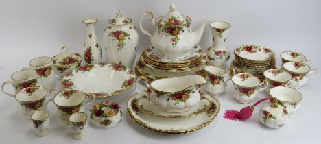 A group of Royal Albert ‘Old Country Roses’ pattern porcelain wares. Vases, teacups, saucers, bowls,