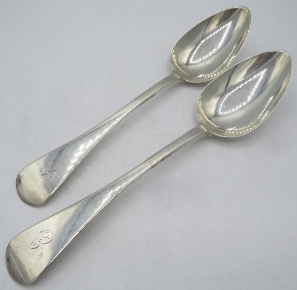 A pair of Georgian silver table spoons, Newcastle 1802, Thomas Watson. Approx weight 4 troy oz/124