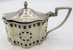 A silver mustard pot in the Georgian style, Birmingham 1975, with blue liner. Approx silver weight