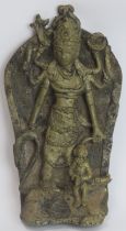 A Hindu bronze wall plaque, Nepal, 19th century or later. Possibly depicting Vishnu. 22 cm height.