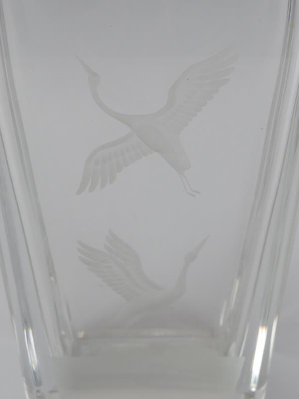An Orrefors Swedish clear crystal glass vase, 20th century. Engraved with cranes in flight above a - Image 2 of 4