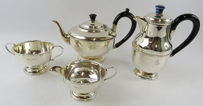 Four piece 1930s silver tea set with beaded decoration and bakelite handles. Hallmarked for