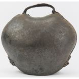 An antique cast iron cowbell, 19th century. 25 cm height. Condition report: Some age related wear