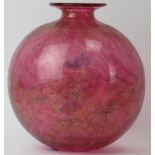 A large Isle of Wight mottled red and aventurine glass vase. Of globular form with factory label