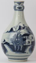 A Chinese blue and white porcelain vase, 19th century. Of pear shaped form, decorated with a