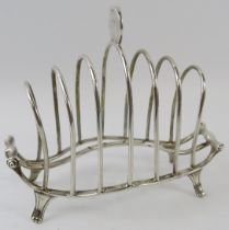 An Edwardian silver boat shaped six slice toast rack, hallmarked for London 1905, maker William