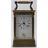 A French L'Epee brass carriage clock, 20th century. Frame with corner columns, dial signed ‘L’Epee