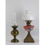 Two British Duplex brass and glass oil lamps, late 19th/early 20th century. (2 items) 58.5 cm