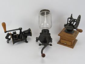 Three vintage coffee grinders. Comprising an Arcade and Spong & Co Ltd. wall mounting coffee grinder