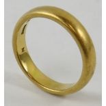 A gent’s 22ct yellow gold wedding band of court profile, finger size P, Hallmarked Birmingham