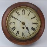 A mahogany wall clock, late 19th/early 20th century. With Roman numeral dial and hinged brass bezel.