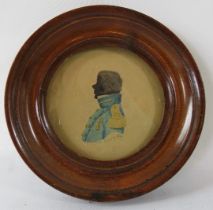 A framed miniature silhouette/watercolour. W M Berry 1917. 8cm diameter. Condition report: No issues