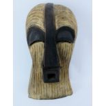 Tribal Art: An African carved and painted wood mask, Songye people, Congo. 39 cm height. Condition