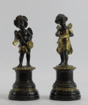 A pair of French bronzed brass figures of a fairy and angel after Auguste Moreau, 20th century.
