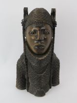 Tribal Art: An African Benin style carved wood bust. 42.5 cm height. Condition report: Some age