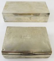 Two silver cigarette boxes, one bearing engraved signatures. Hallmarked for Birmingham 1932 and