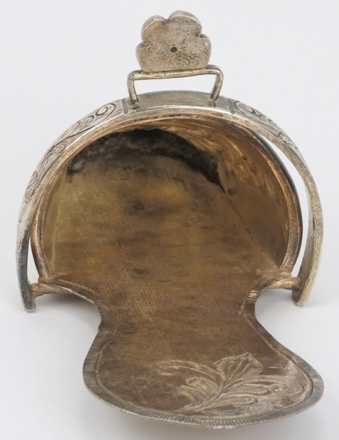 A Peruvian plated copper ladies stirrup, 19th century. Of slipper form, repoussé decorated with - Image 3 of 4